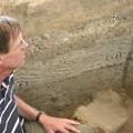 Ian Hodder inspects a section of Neolithic inscriptions in the walls at Catalhuyuk (Photo: Harvey Whitehouse)