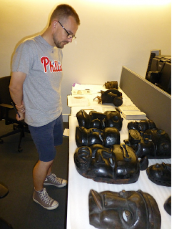 David Pratten examining Nigerian Masks