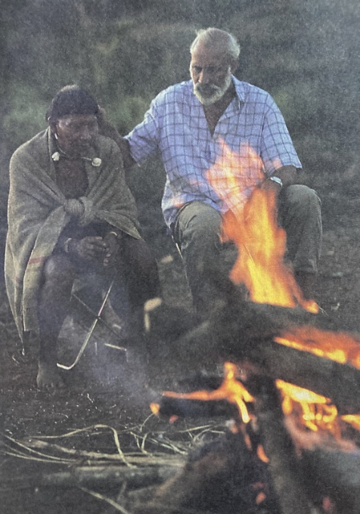 Photo of Maybury Lewis and Sipuba sitting by a fire