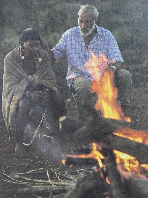 Photo of Maybury Lewis and Sipuba sitting by a fire