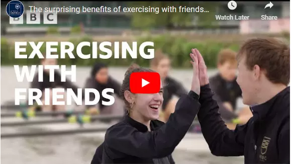 rowers high fiving - opening screen shot of the Exercising with Friends video