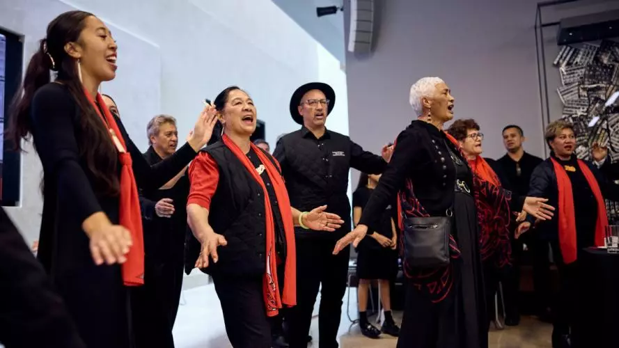 Members of the Māori community perform songs of appreciation during lunch at the Weston Library.