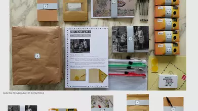 An image showing envelopes, notebooks cameras maps, a sample bag and packaging that makes up the tool kit