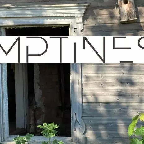 Emptiness logo on background of a wooden building