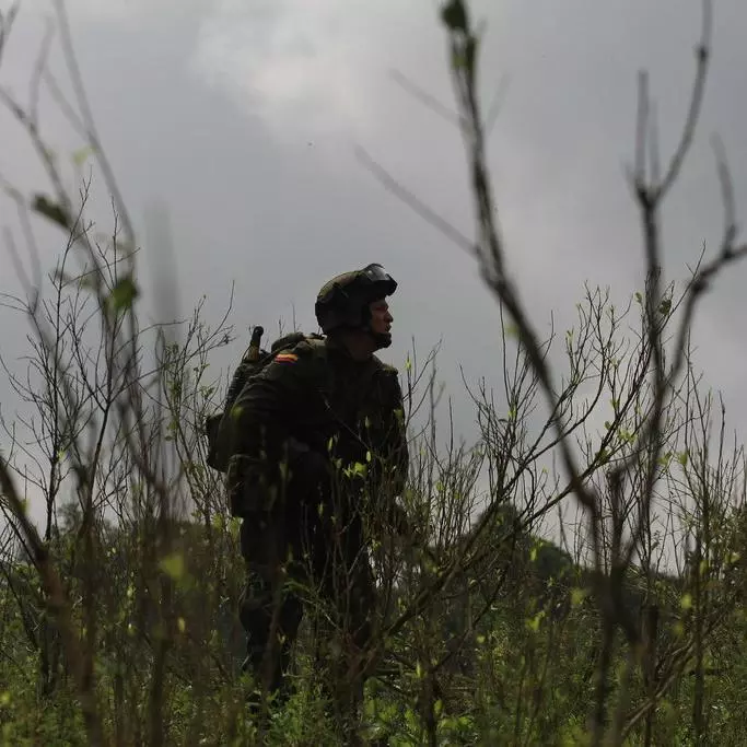 Anti-Narcotics Police in combat gear in a field