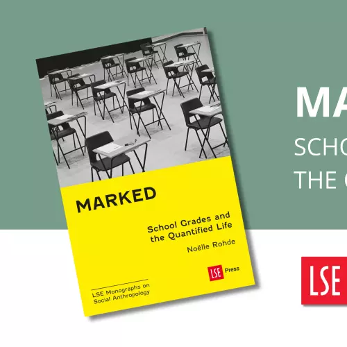 Cover of marked showing a room set up for exams