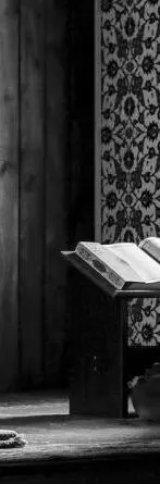 Man kneeing at book