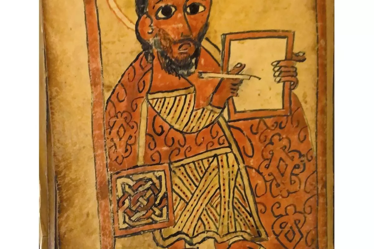 Photo of an illustrated page from a large manuscript