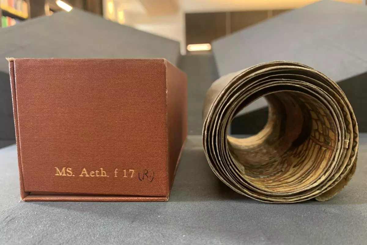 Photo from side of a vellum roll and it's library container. 